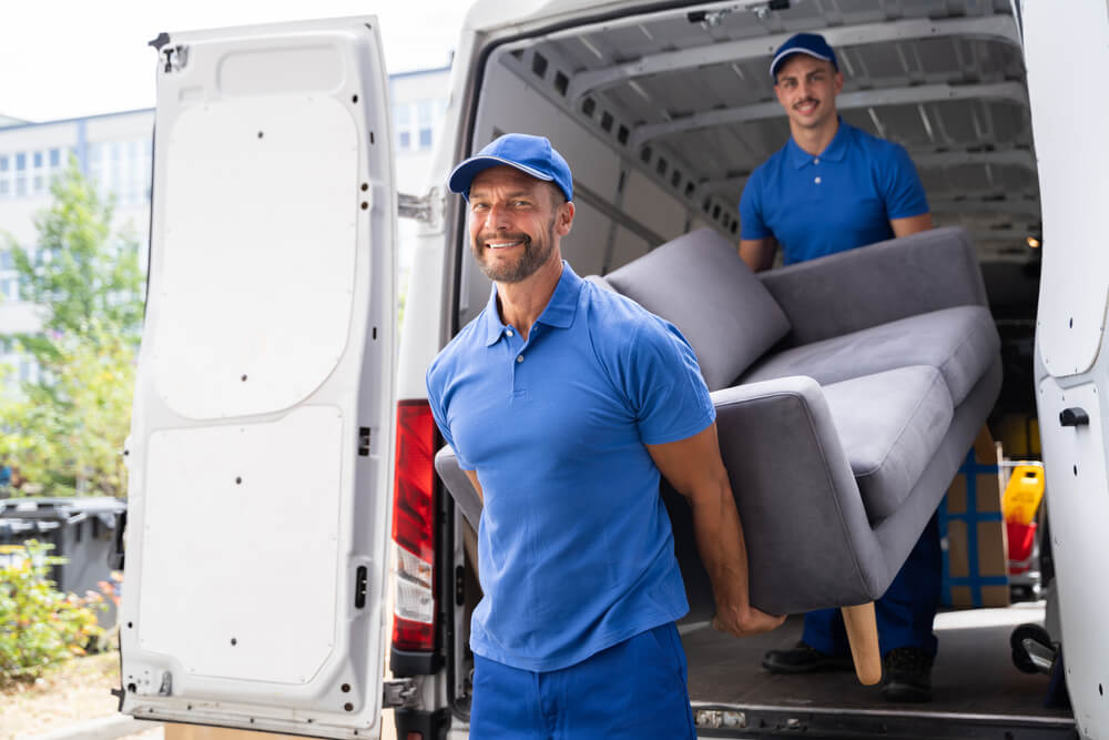 Moving Company Staff Organizing Fragile Items